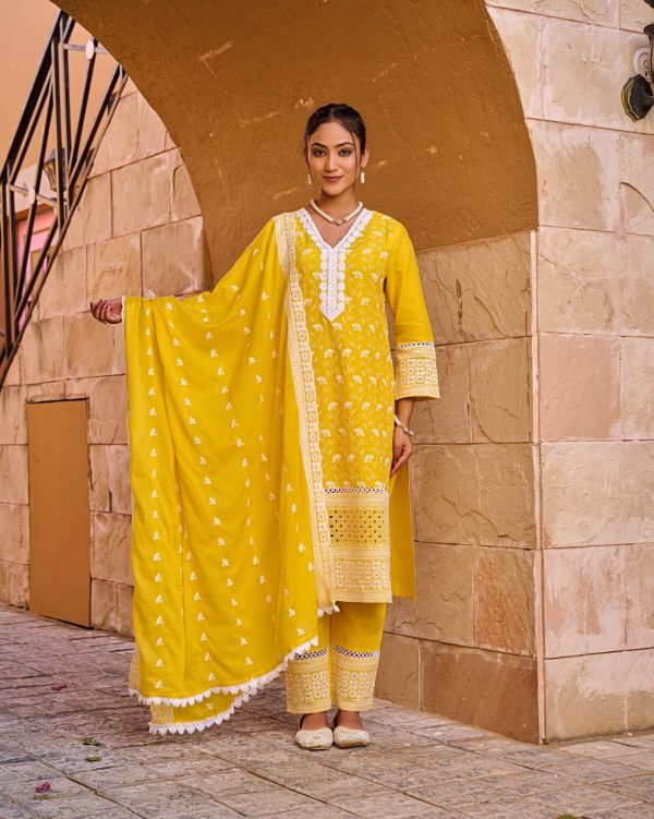 Woman wearing a marigold yellow 3-piece cotton kurti set with intricate white embroidery and dupatta – The Elegance Corner